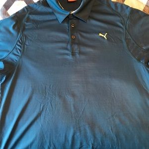 Teal Puma golf shirt size L
